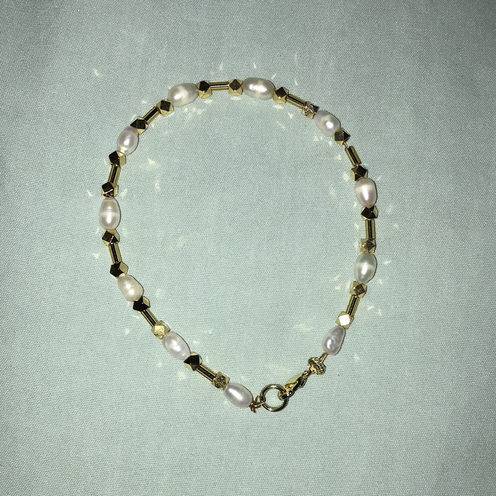 Handmade pearl and gold filled bead bracelet.